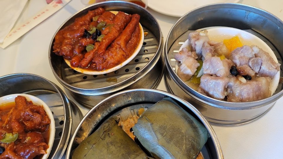 Restaurant menu featuring congee, fried rice, and desserts.
