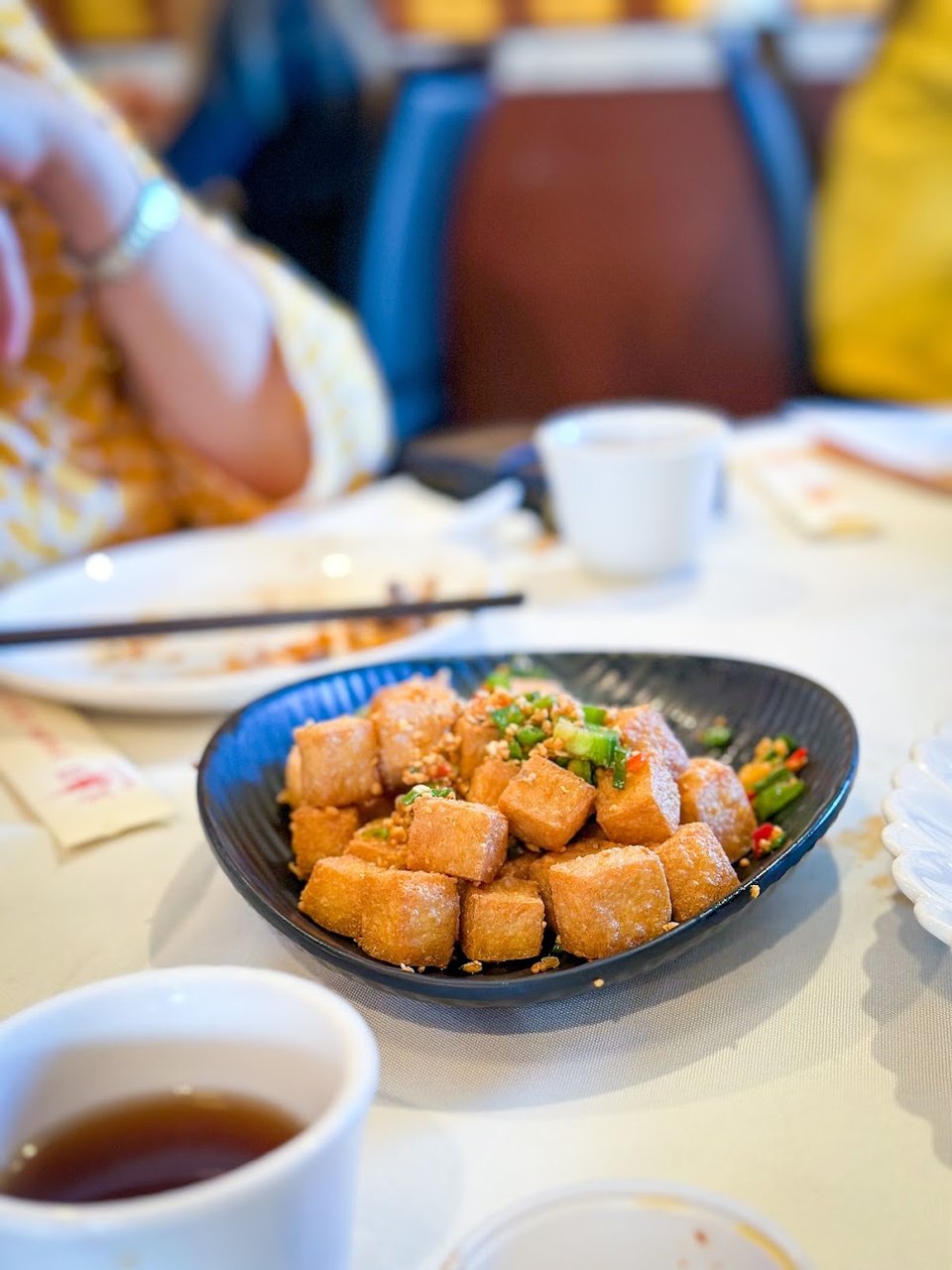 Menu spread showing soups, appetizers, and family meals.