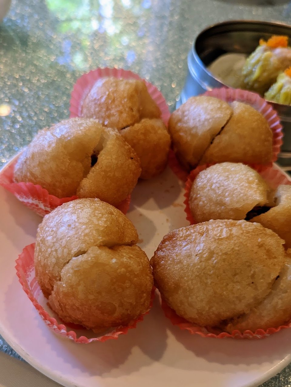 Restaurant menu featuring congee, fried rice, and desserts.